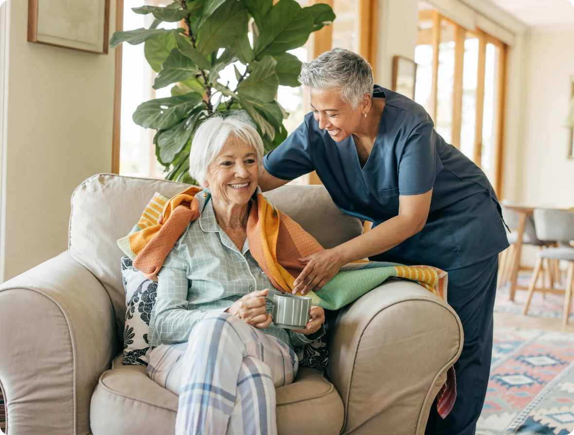 Elderly woman receiving care at home.